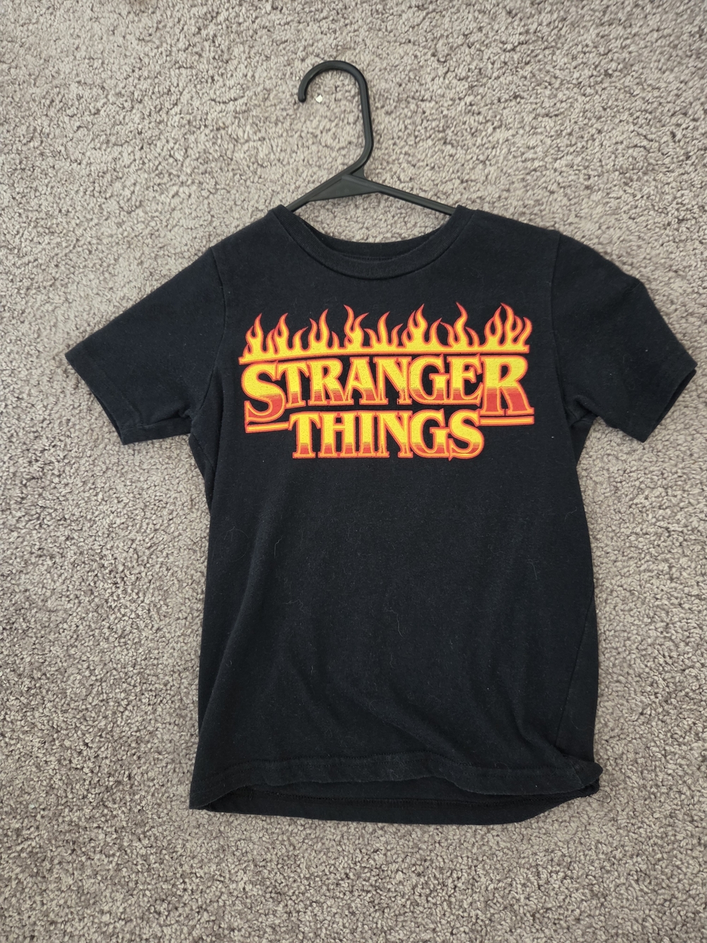 Netflix Kids Black Tee with Yellow & Orange Flame Logo